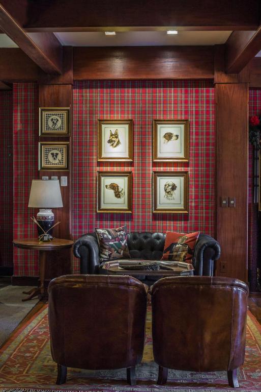 Uma área de estar em Hotel Casa da Montanha