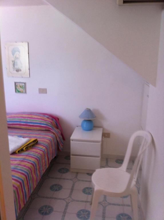 Кровать или кровати в номере Rosa Marina Frontline Beach