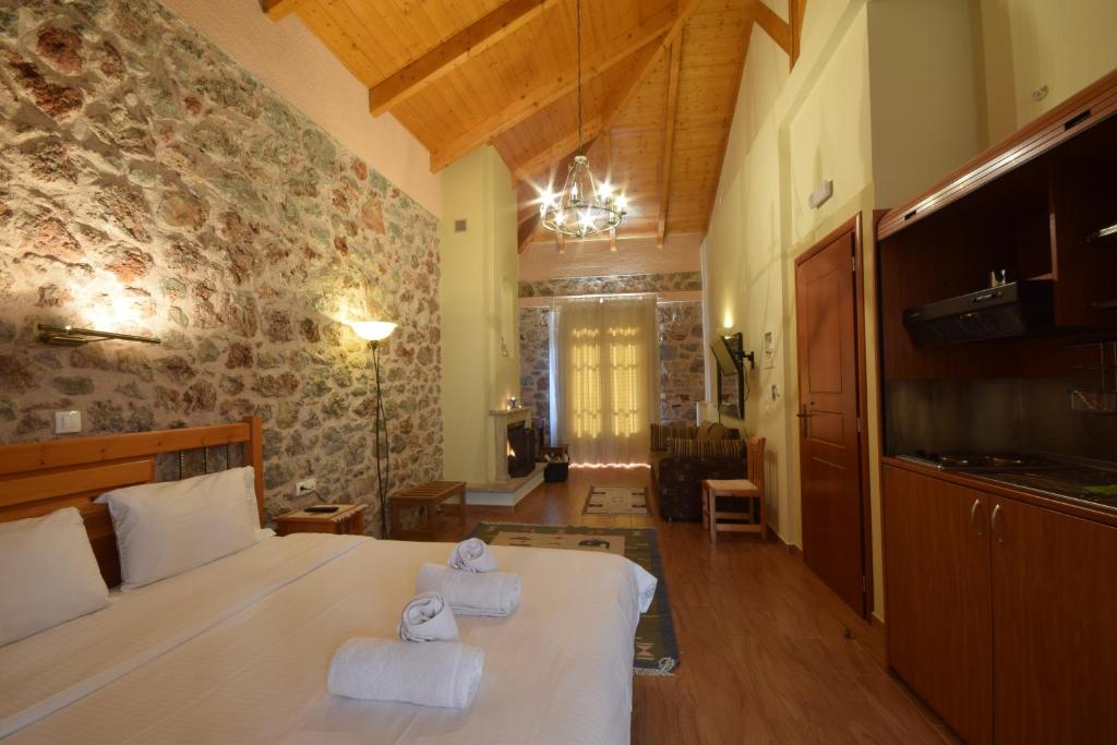 Posteľ alebo postele v izbe v ubytovaní Hotel Parnassos