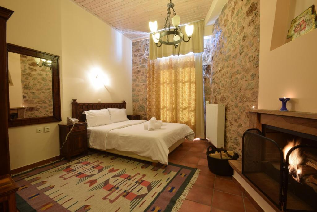 Posteľ alebo postele v izbe v ubytovaní Hotel Parnassos