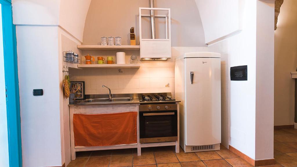 Kuchyň nebo kuchyňský kout v ubytování La Casetta