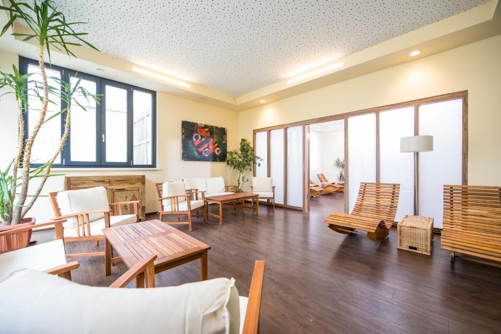 TV a/nebo společenská místnost v ubytování Hotel Saxenhof