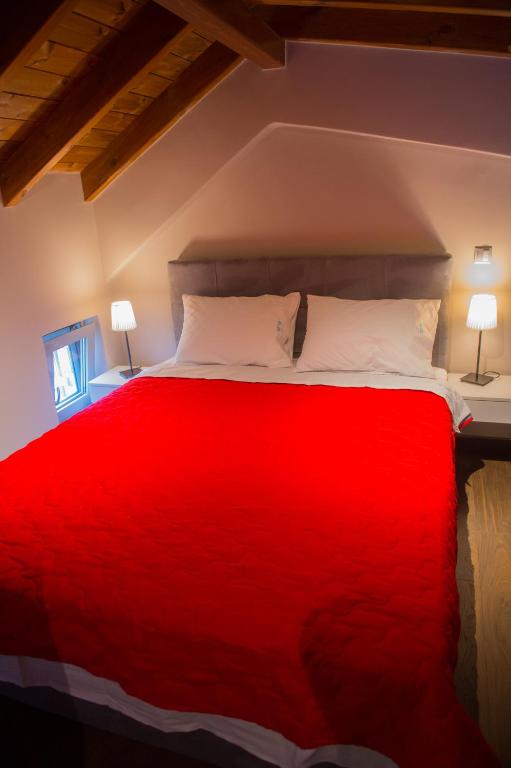 Łóżko lub łóżka w pokoju w obiekcie Agios Mamas Resort