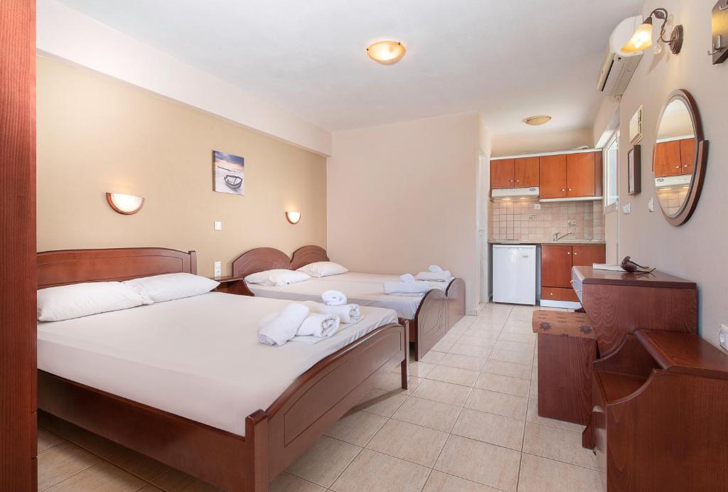 Postel nebo postele na pokoji v ubytování House Meltemi
