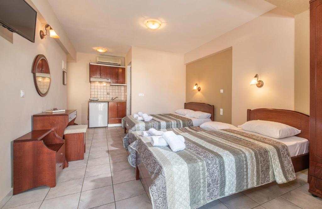 Postel nebo postele na pokoji v ubytování House Meltemi