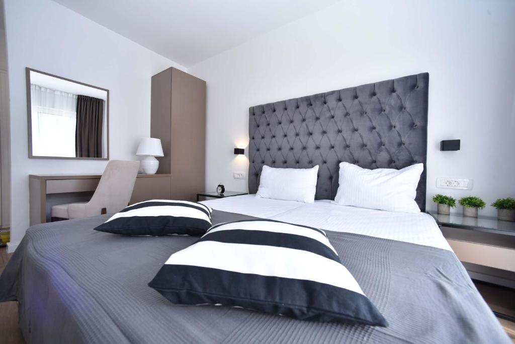Postel nebo postele na pokoji v ubytování Apartments 110 in Budva