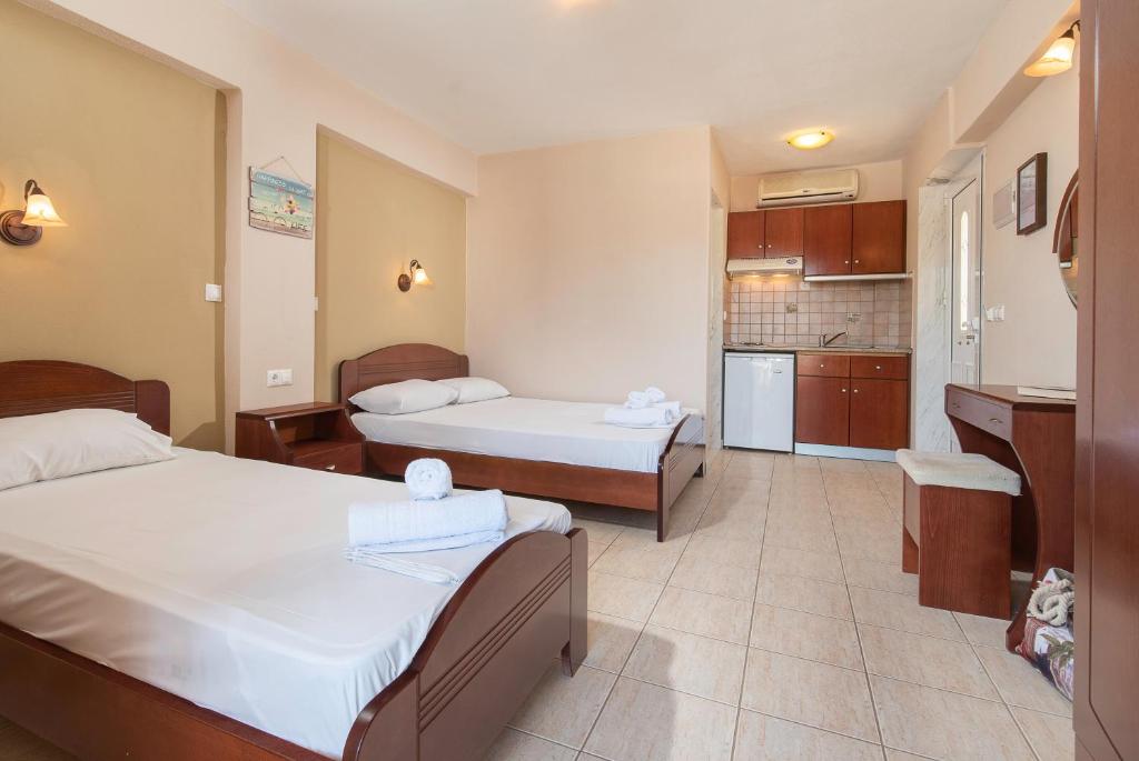 Postel nebo postele na pokoji v ubytování House Meltemi
