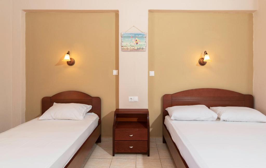 Postel nebo postele na pokoji v ubytování House Meltemi