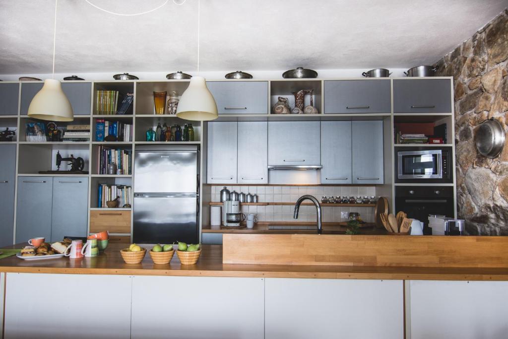 Kuchyň nebo kuchyňský kout v ubytování Plori House