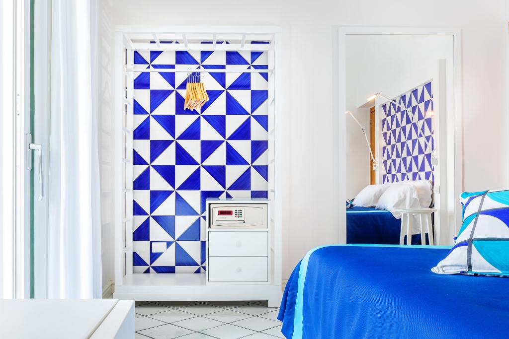 Postel nebo postele na pokoji v ubytování Hotel Torre Barbara