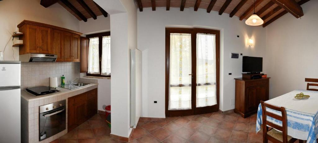 Kuchyň nebo kuchyňský kout v ubytování Agriturismo Le Case
