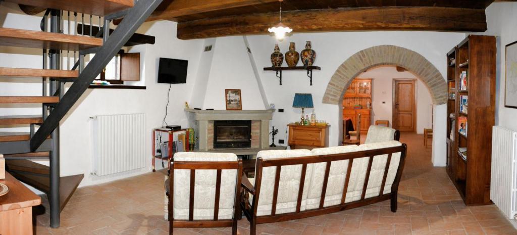 TV a/nebo společenská místnost v ubytování Agriturismo Le Case