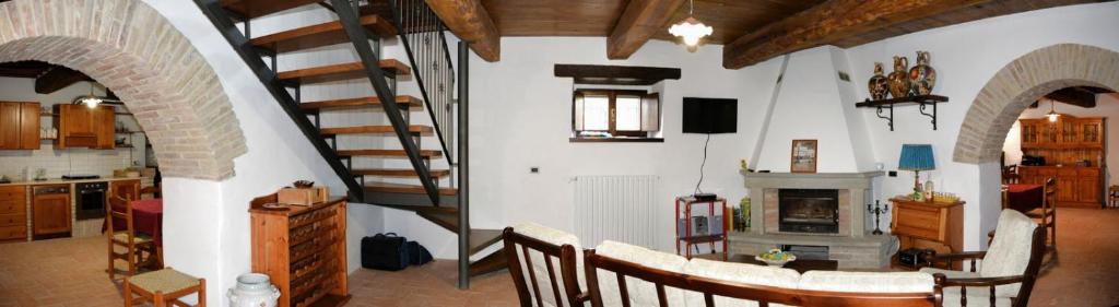 TV a/nebo společenská místnost v ubytování Agriturismo Le Case