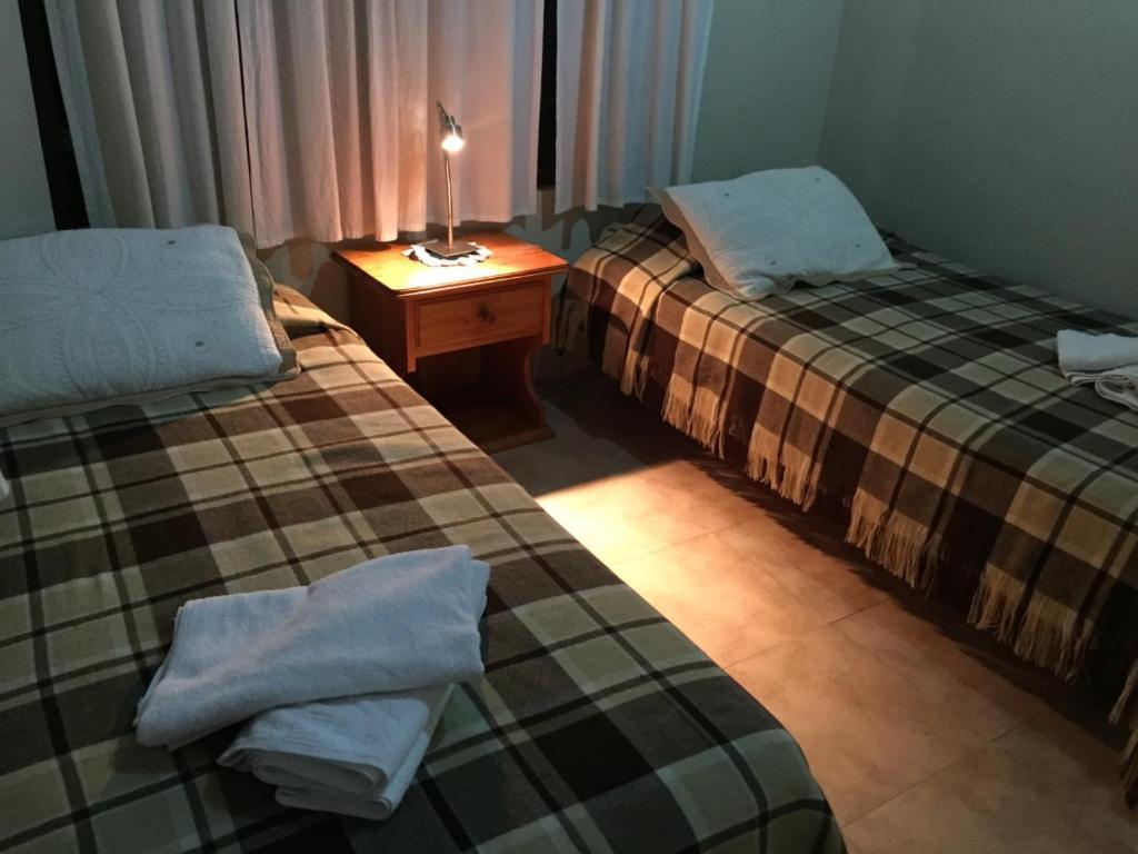 Postel nebo postele na pokoji v ubytování Casa de Lelia