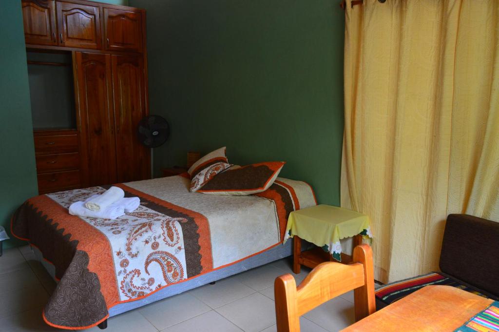 Postel nebo postele na pokoji v ubytování Casa de Lelia