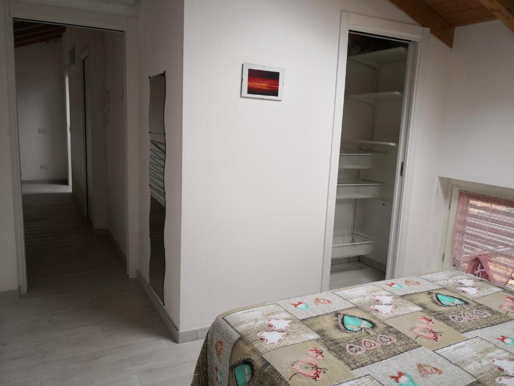 Postel nebo postele na pokoji v ubytování Charme Lake Loft