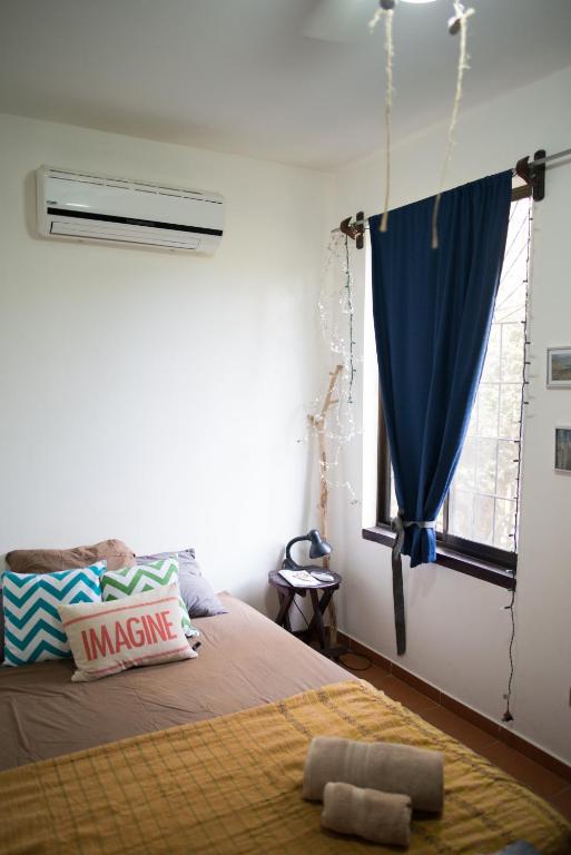 Postel nebo postele na pokoji v ubytování Casa del Sol