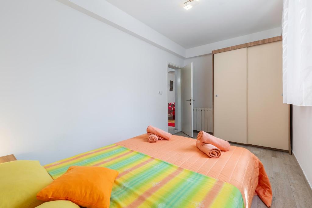 Posteľ alebo postele v izbe v ubytovaní Guest House Ravnić