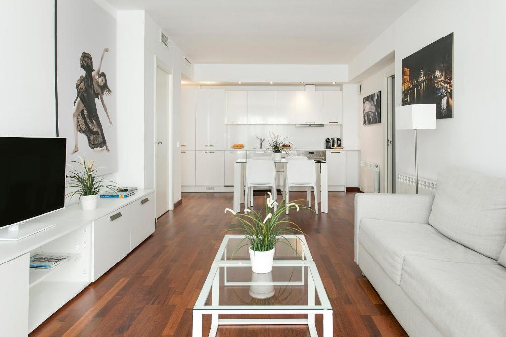 Kuchyň nebo kuchyňský kout v ubytování Glasir Apartments Barcelona