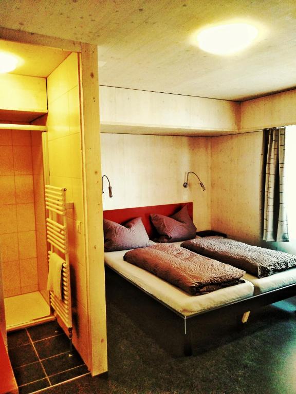 Letto o letti in una camera di Gasthaus Ochsen
