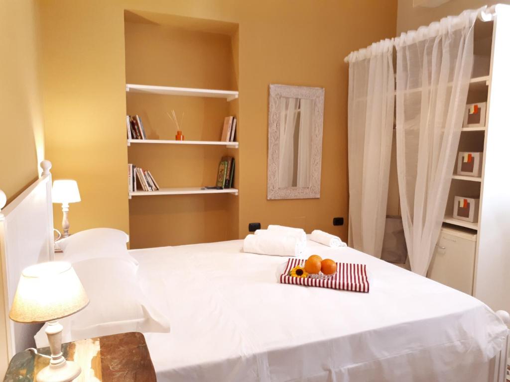 Postel nebo postele na pokoji v ubytování Sofia Family Suites