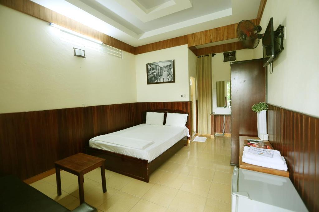 Postel nebo postele na pokoji v ubytování Homestay Hong Cong