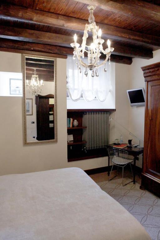Postel nebo postele na pokoji v ubytování B&B Al Convento