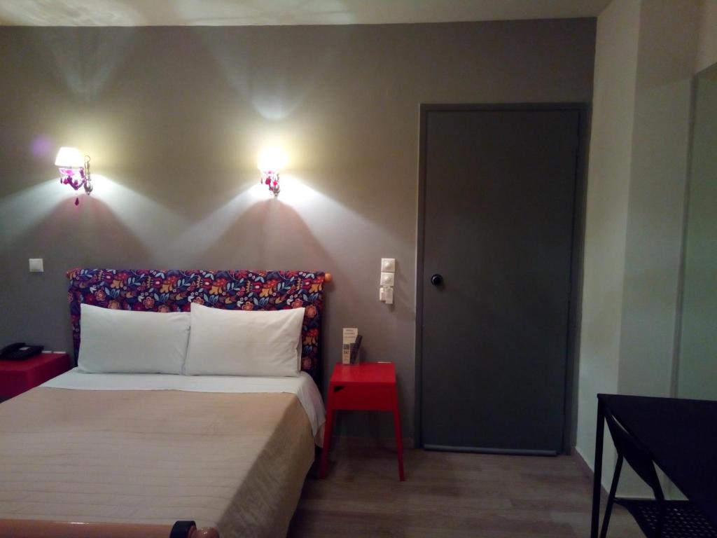 Posteľ alebo postele v izbe v ubytovaní Zappion Hotel