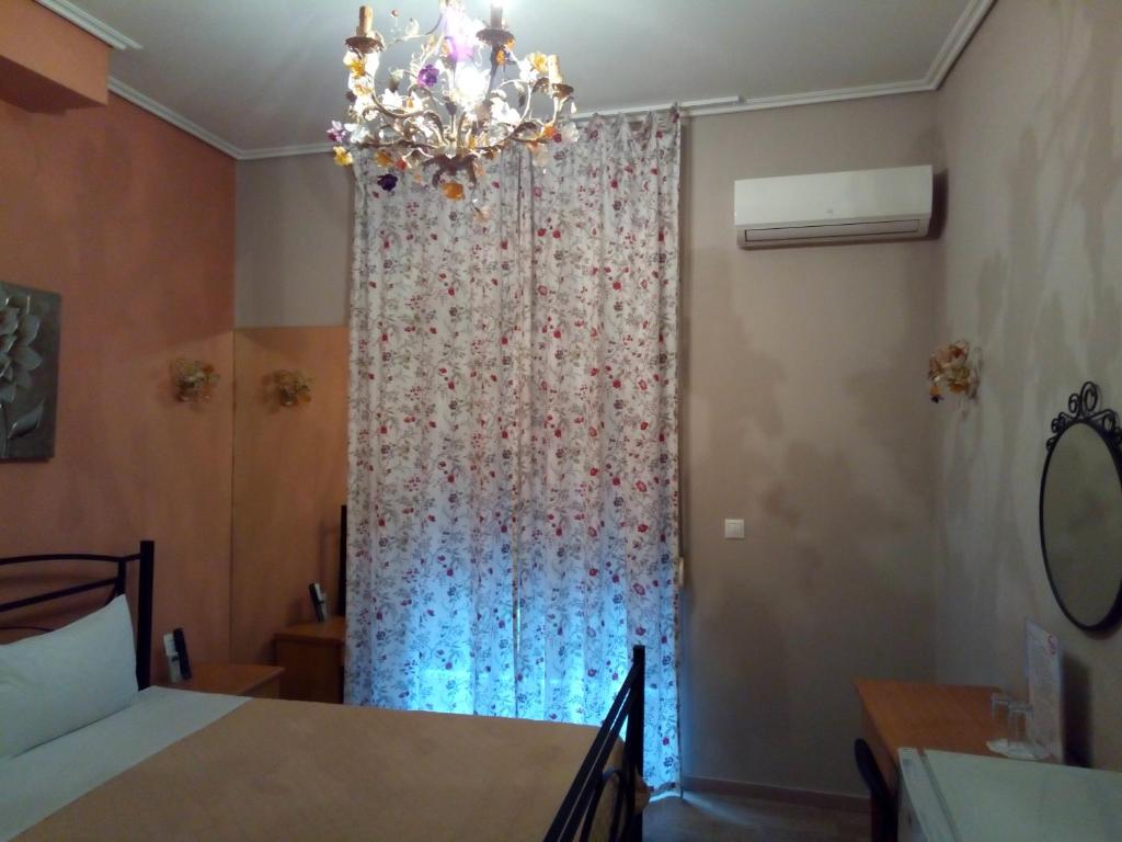 Posteľ alebo postele v izbe v ubytovaní Zappion Hotel