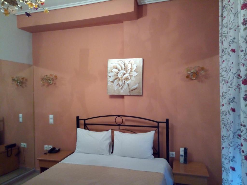 Posteľ alebo postele v izbe v ubytovaní Zappion Hotel