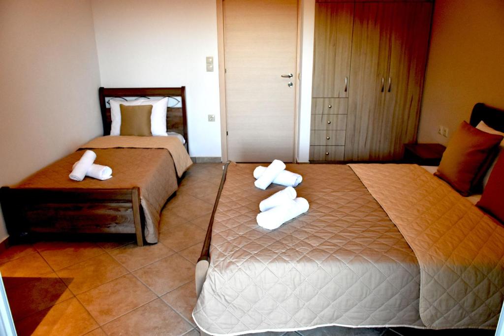 Postel nebo postele na pokoji v ubytování Mersina Apartments