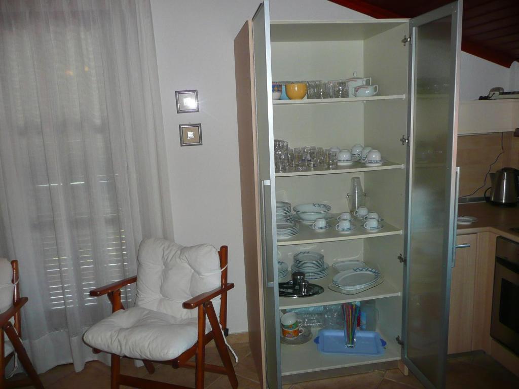 Kuchyň nebo kuchyňský kout v ubytování Kallikratia Holiday Flat 1