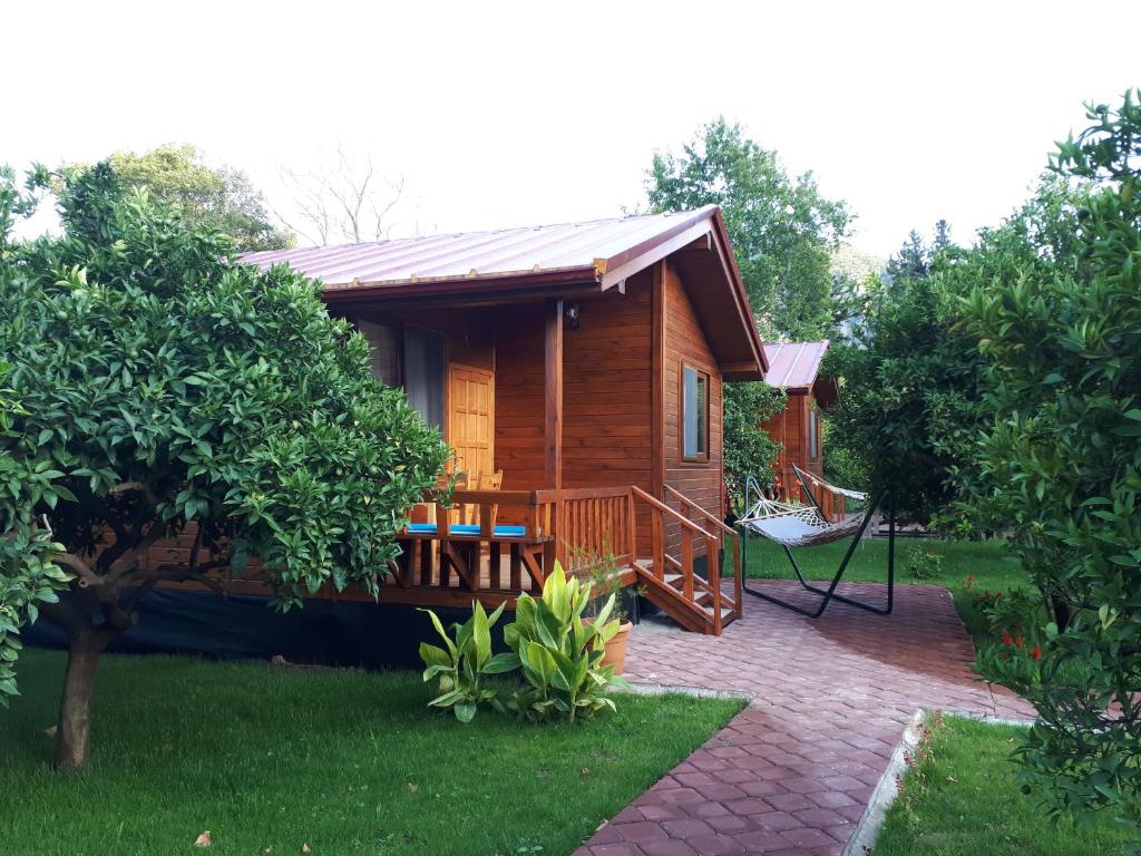 Asya Bungalow Çıralı - Bungalow Met Uitzicht Op De Tuin