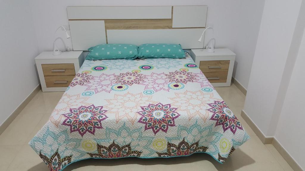 Postel nebo postele na pokoji v ubytování Apartamento Juli4