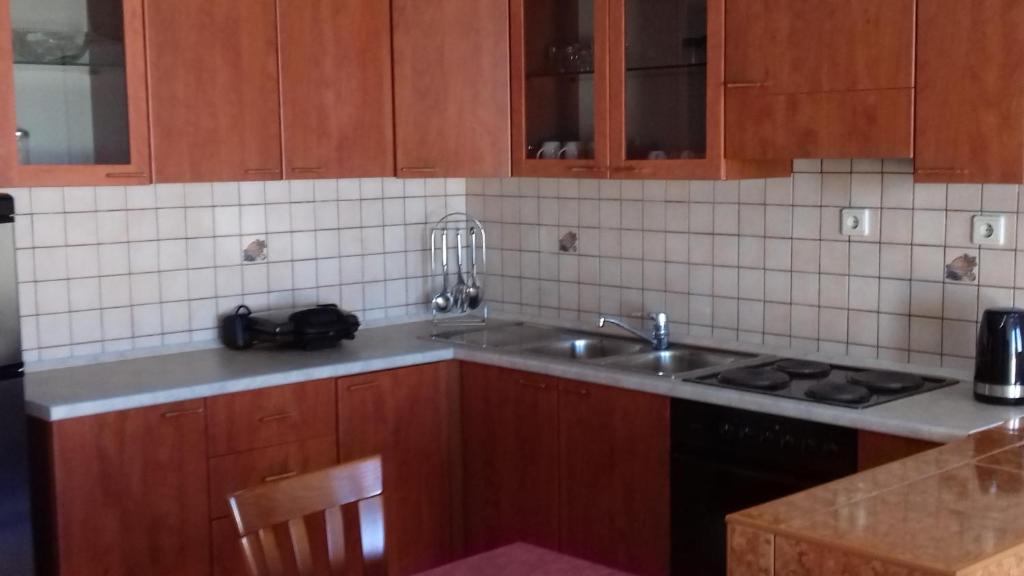 Kuchyň nebo kuchyňský kout v ubytování Apartments Kalsan