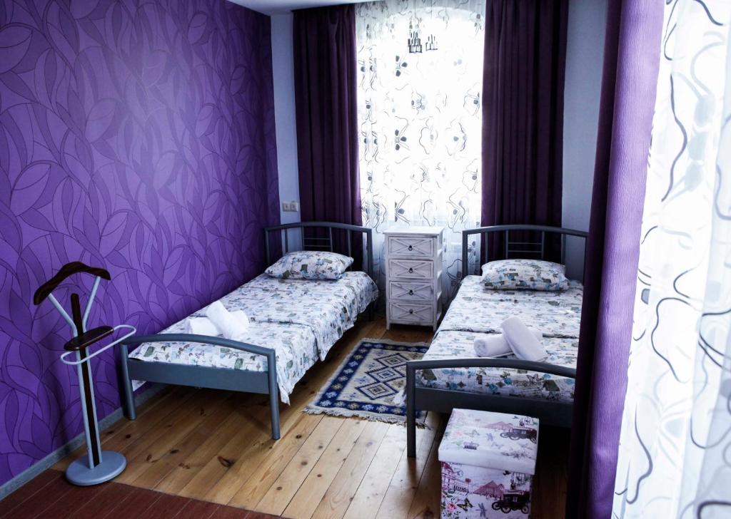 Postel nebo postele na pokoji v ubytování Family Mini-Hotel Martirosyan's and tours