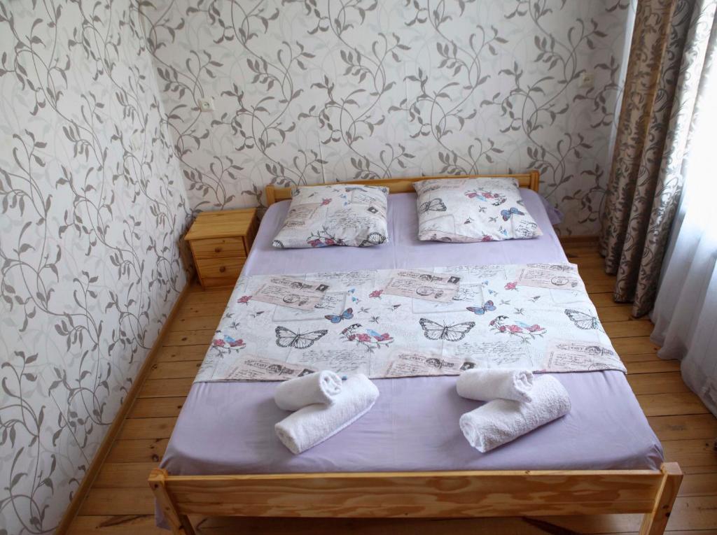 Postel nebo postele na pokoji v ubytování Family Mini-Hotel Martirosyan's and tours
