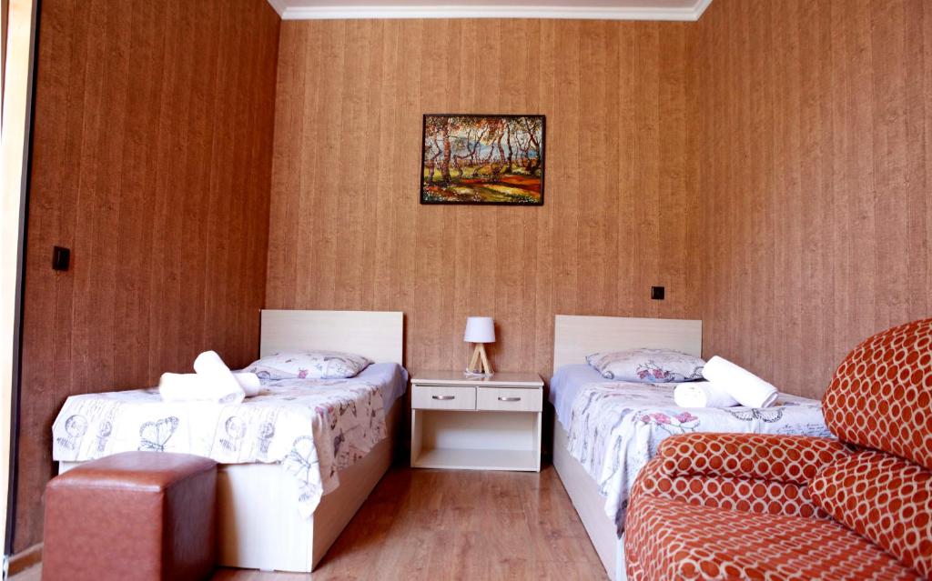 Postel nebo postele na pokoji v ubytování Family Mini-Hotel Martirosyan's and tours