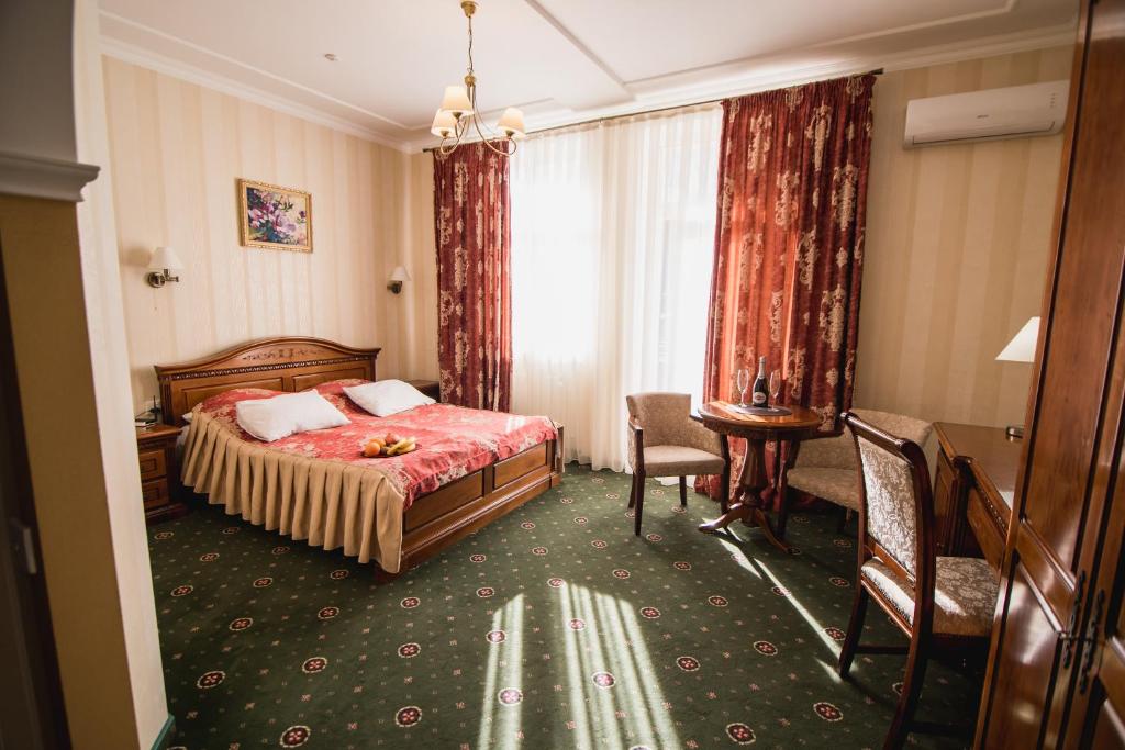 Postel nebo postele na pokoji v ubytování Hotel Sofia