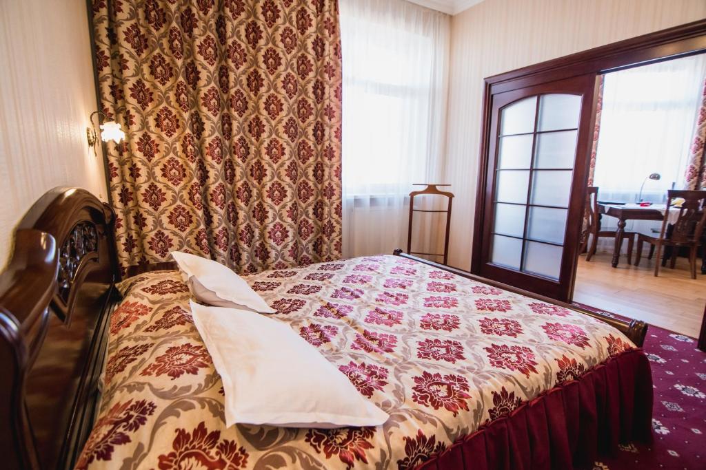 Postel nebo postele na pokoji v ubytování Hotel Sofia