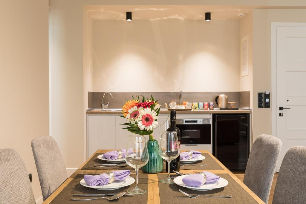 Kuchyň nebo kuchyňský kout v ubytování Klepsydra Urban Suites