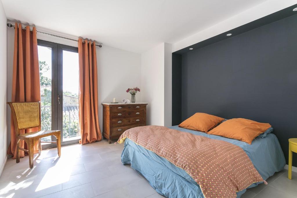 Voodi või voodid majutusasutuse Domaine Sesquier Mas d'exception Belle de Nuit toas
