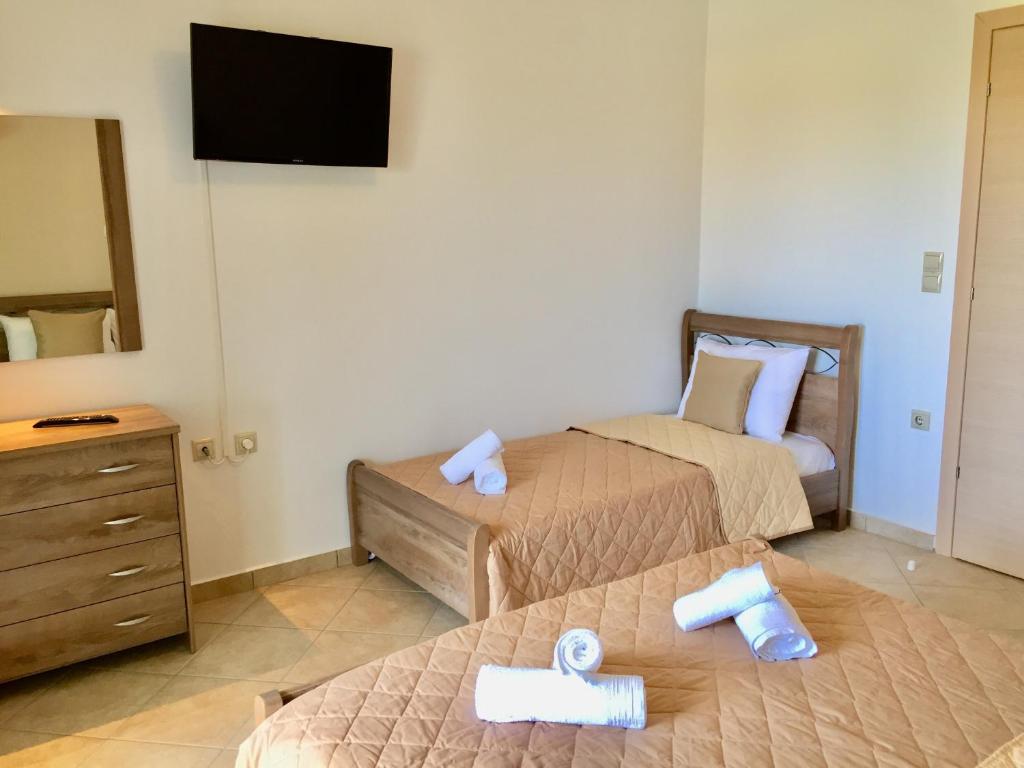 Postel nebo postele na pokoji v ubytování Mersina Apartments