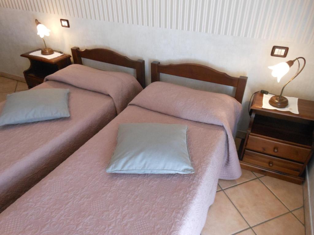 Postel nebo postele na pokoji v ubytování Cà 'd Gnese