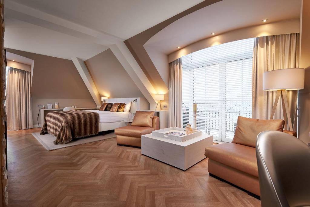Postel nebo postele na pokoji v ubytování Van der Valk Hotel Groningen-Westerbroek