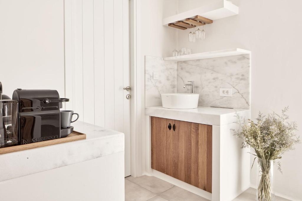 Kuchyň nebo kuchyňský kout v ubytování Boho Private Luxury Suites