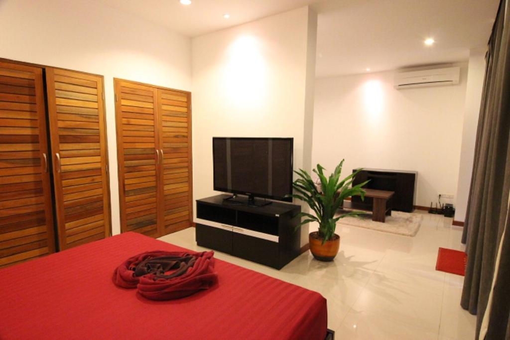 TV a/nebo společenská místnost v ubytování Tropical Sea View Residence