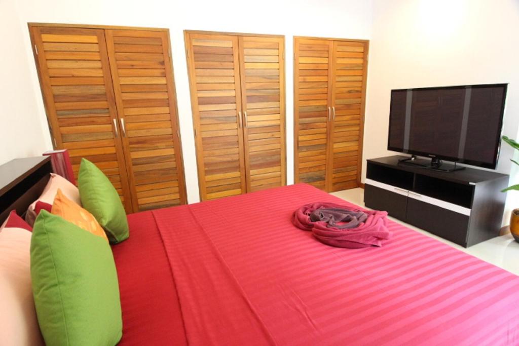 TV a/nebo společenská místnost v ubytování Tropical Sea View Residence