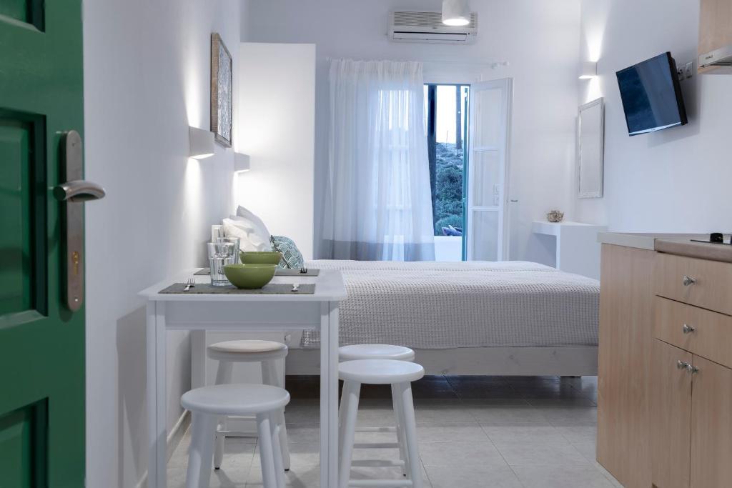 Postel nebo postele na pokoji v ubytování Gaia lux inn