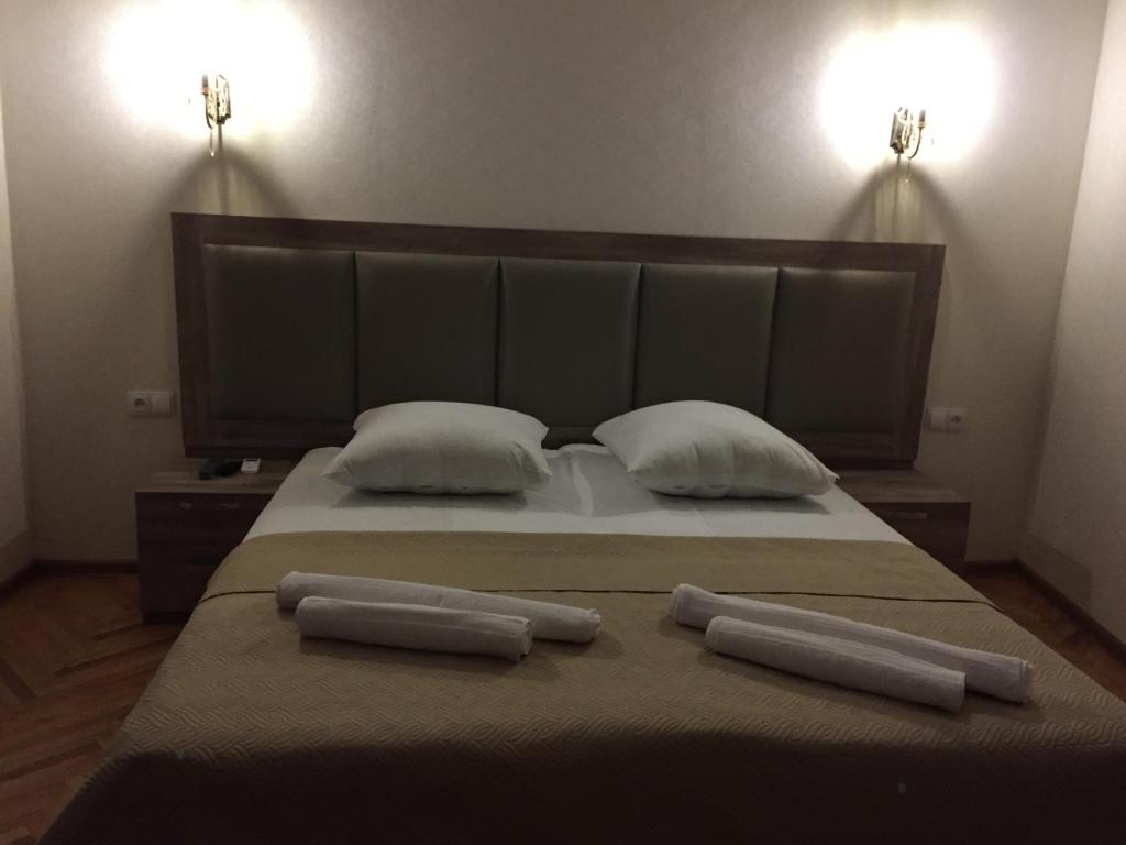 Postel nebo postele na pokoji v ubytování Guest House Rafael
